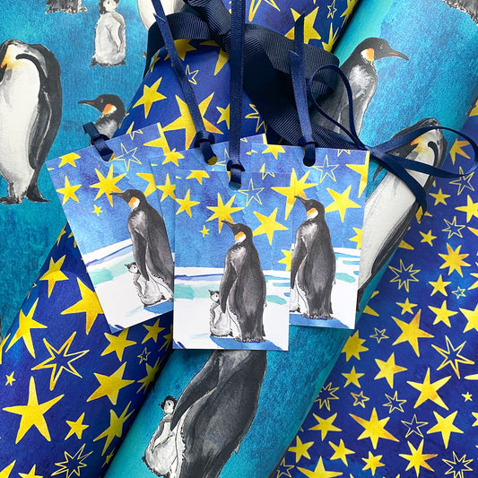 Christmas wrap and penguin gift tags