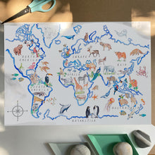 Load image into Gallery viewer, World map art print, with more than 70 animal illustrations across the 7 continents