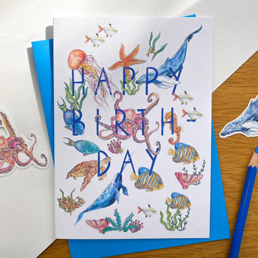 Happy birthday card with sea creatures and blue envelope