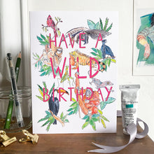 Load image into Gallery viewer, Have a Wild Birthday greetings card with animals on mantlepiece