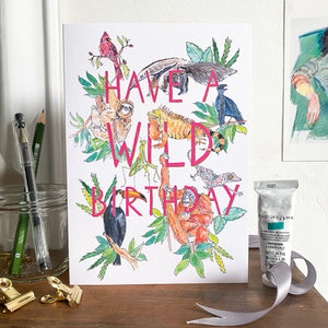 Have a Wild Birthday greetings card with animals on mantlepiece