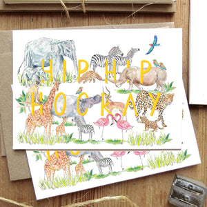 Hip Hip Hooray card with animals flatlay