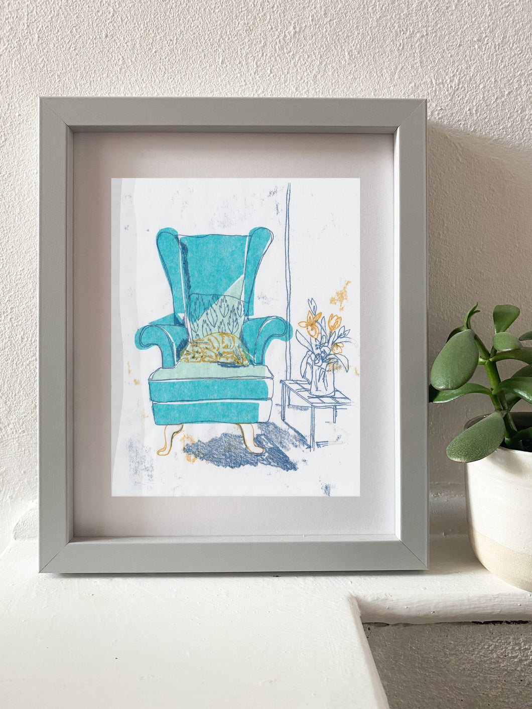 Turquoise & Orange armchair with cat print